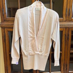 Escada Ballet Pink sweater, camisole and silk pleated skirt.